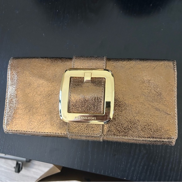 Michael Kors Handbags - MICHAEL KORS Gold Large Buckle Clutch